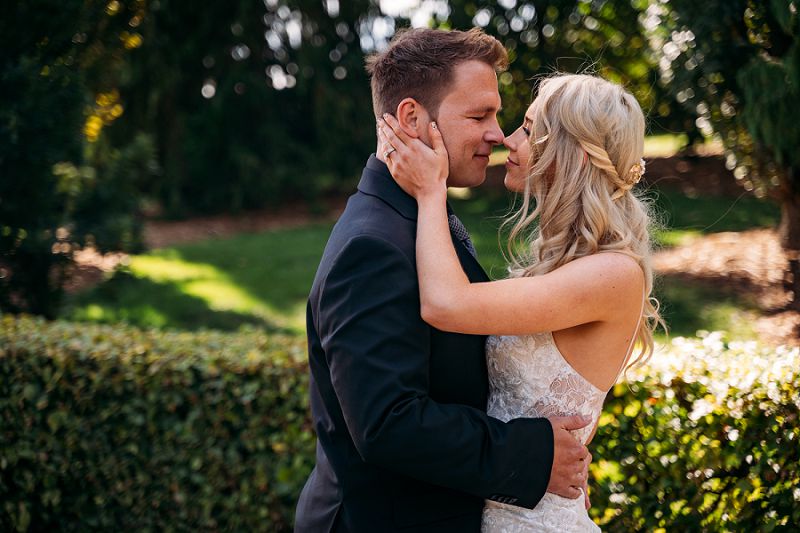 bride and groom looking at eachother